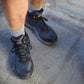 Ariat Men's Outpace Shift Mid Composite Toe Work Shoe in Dark Shadow, lifestyle view