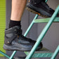 Ariat Men's Outpace Shift 6-inch Waterproof Composite Toe Work Boot in Black, lifestyle view
