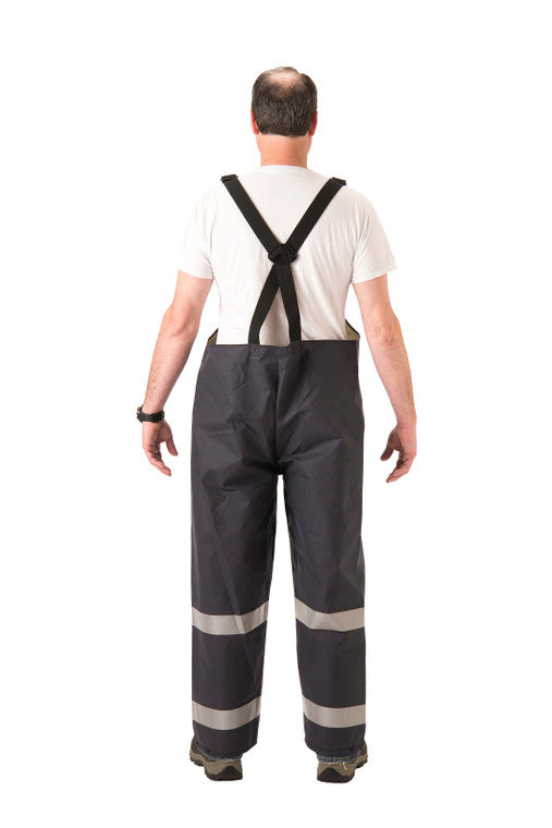 NASCO PetroStorm FR rain bib overalls with reflective trim in Navy, worn back view