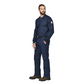 Man wearing a Bulwark FR navy blue work uniform with a logo on a white background