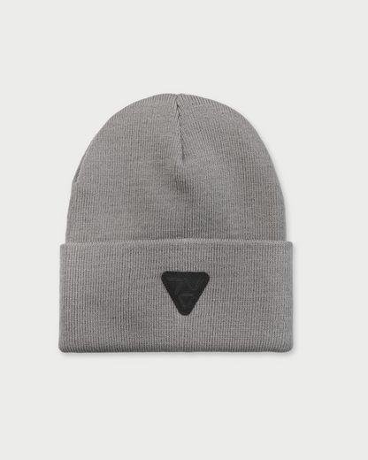 Vohl Beanie in Pewter, front view with black triangular logo patch on folded cuff - SKU AC-BN-700-OS | color:Pewter