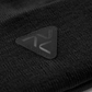 Close-up of Vohl Beanie in Black showing tonal triangular logo patch and knit texture - SKU AC-BN-900-OS | color:Black