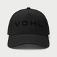 Front view of black Vohl Cap with tonal embroidered Vohl logo and curved stitched brim - SKU AC-CV-900-OS | color:Black