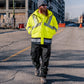 Men’s hi-vis yellow insulated waterproof jacket with reflective tape, worn on a construction site – SKU HV-IJ-105 | color:Safety Yellow