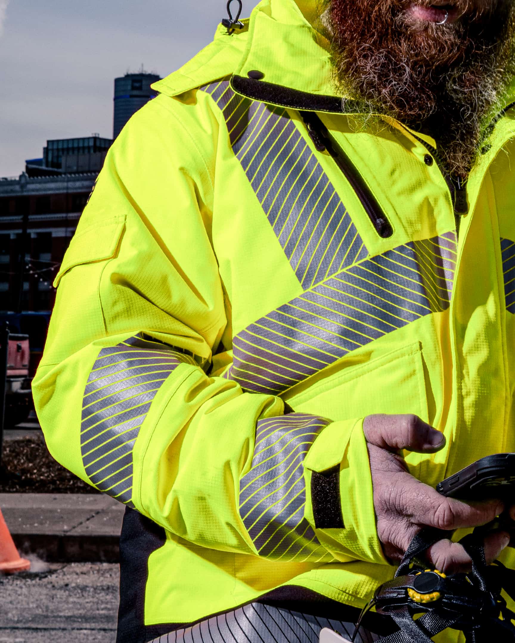 Close-up of hi-vis yellow insulated waterproof jacket with reflective detailing and zip pocket – SKU HV-IJ-105 | color:Safety Yellow