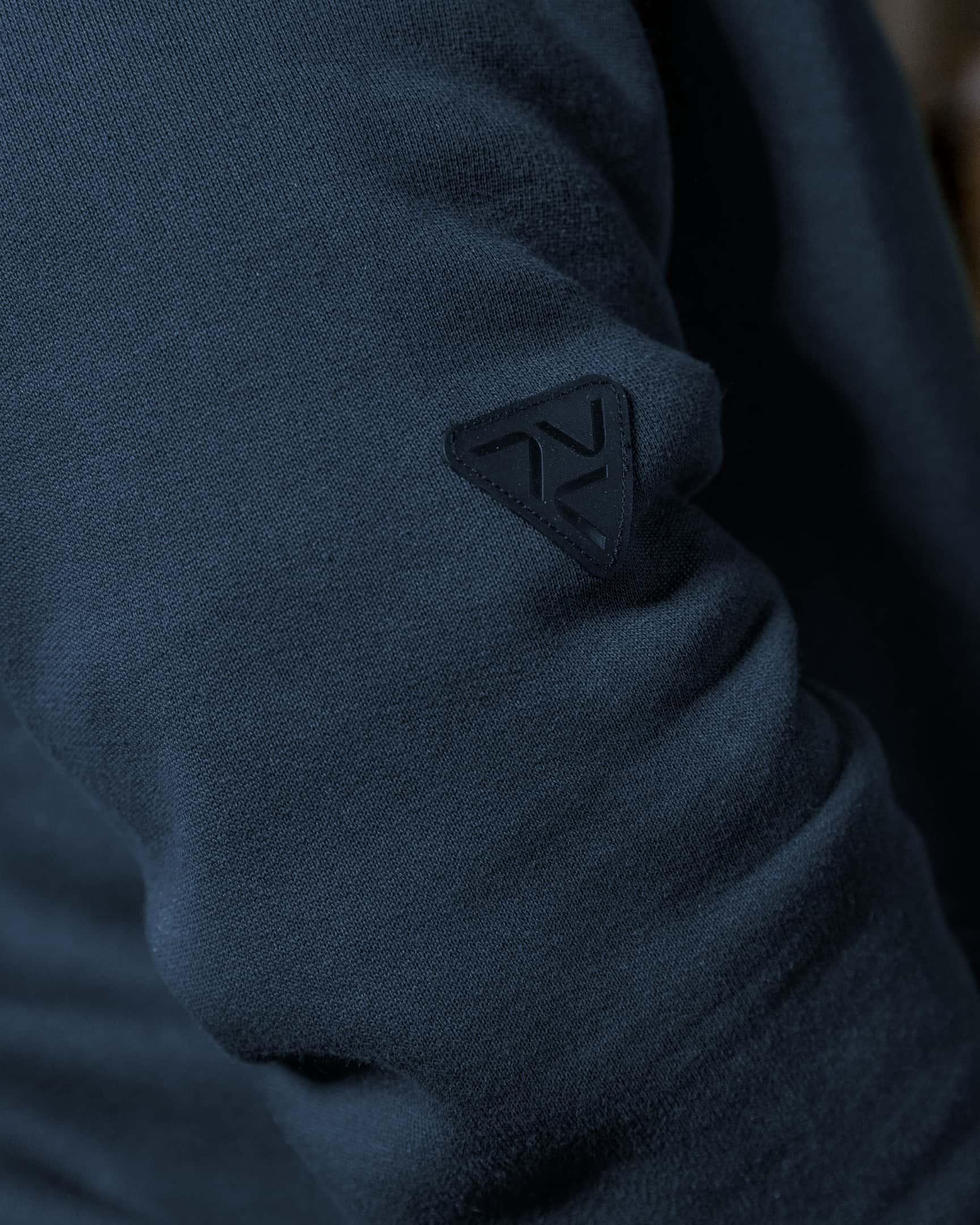 Close-up of blue heavyweight fleece hoody sleeve pocket with zipper and pen slot – SKU WW-PO-600 | color:Detroit Blue