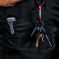 Close-up of Black straight leg work pants pocket with keys clipped to D-ring and tool pocket – SKU WW-SP-900 | color:Black