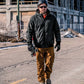 Men’s Black quilted lined work jacket worn on construction site with safety helmet – SKU WW-UJ-900 | color:Black